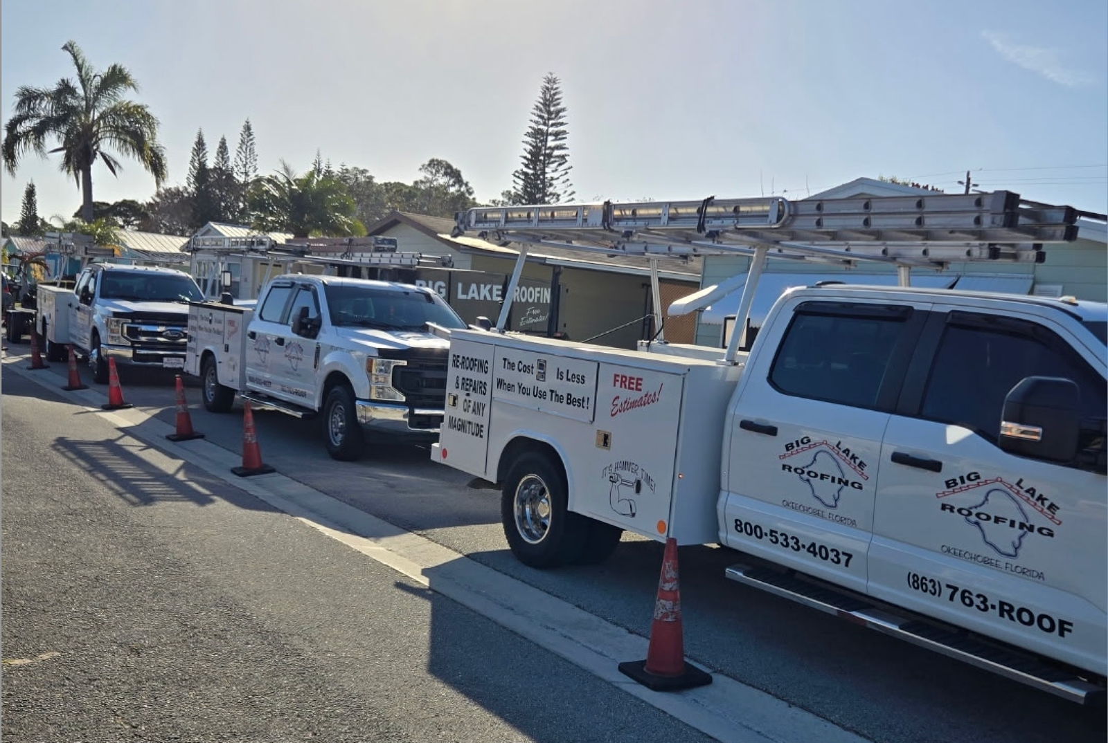 Big Lake Roofing trucks and crew